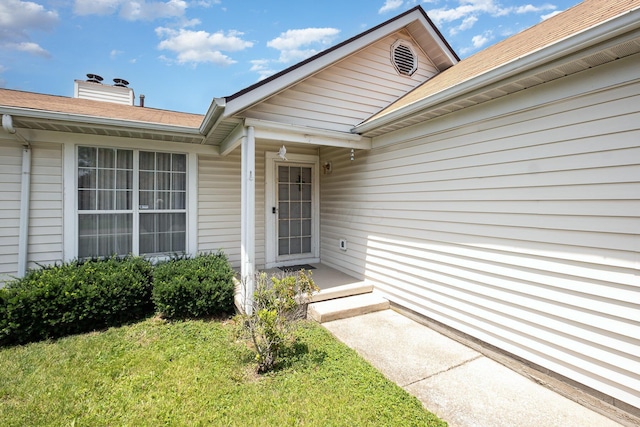 2939 Arrowsmith Dr, Reynoldsburg, OH 43068 - doorway to property featuring a chimney and a shingled roof