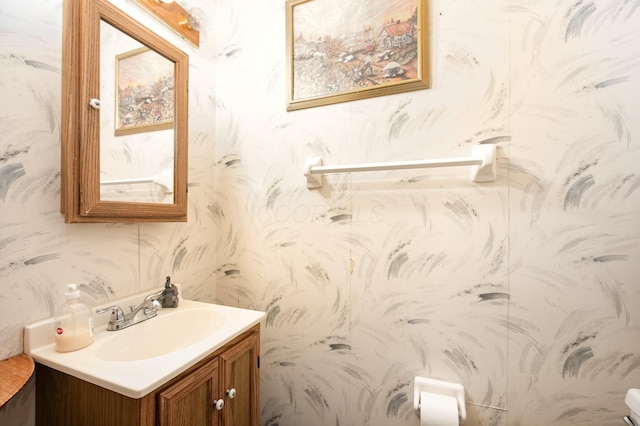2939 Arrowsmith Dr, Reynoldsburg, OH 43068 - half bath featuring wallpapered walls and vanity