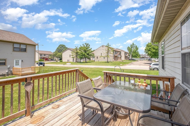 2939 Arrowsmith Dr, Reynoldsburg, OH 43068 - wooden terrace with a residential view, a lawn, and outdoor dining area
