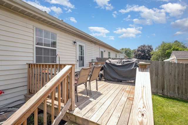 2939 Arrowsmith Dr, Reynoldsburg, OH 43068 - wooden deck with outdoor dining area and area for grilling