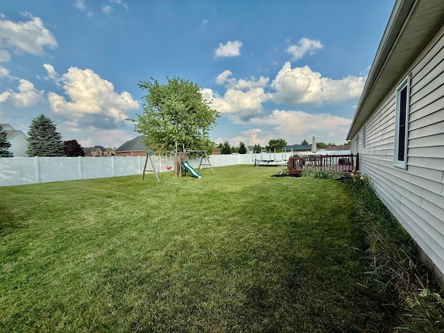 630 Duffy Dr, Washington Court House, OH 43160 - fenced backyard featuring a playground