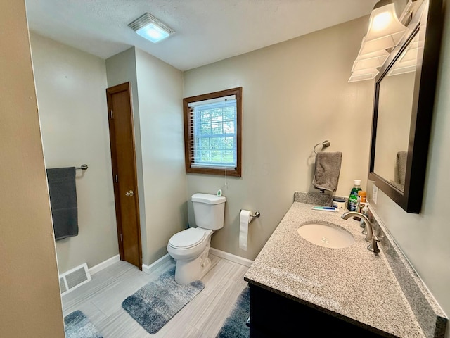 630 Duffy Dr, Washington Court House, OH 43160 - half bathroom with toilet and vanity