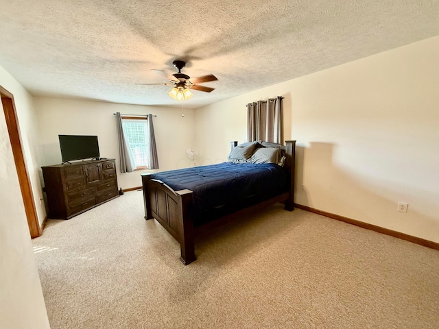 630 Duffy Dr, Washington Court House, OH 43160 - bedroom featuring light carpet, a textured ceiling, and ceiling fan