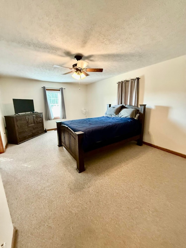 630 Duffy Dr, Washington Court House, OH 43160 - bedroom featuring light colored carpet, a textured ceiling, and ceiling fan