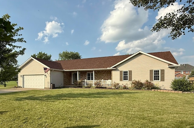 630 Duffy Dr, Washington Court House, OH 43160 - ranch-style home with a porch, a front lawn, a garage, concrete driveway, and a shingled roof