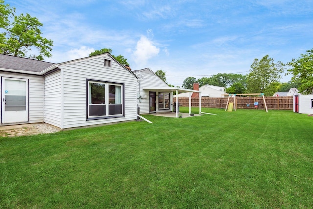 436 Darbyhurst Rd, Columbus, OH 43228 - fenced backyard featuring a playground and a patio area