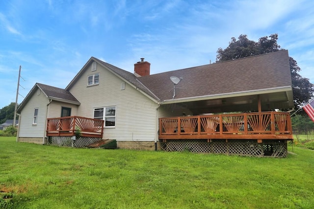 7579 Rangeline Rd, Mount Vernon, OH 43050 - back of property featuring a wooden deck, a lawn, a chimney, and a shingled roof