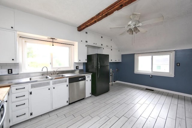 7579 Rangeline Rd, Mount Vernon, OH 43050 - kitchen featuring dishwasher, freestanding refrigerator, white cabinetry, and a ceiling fan