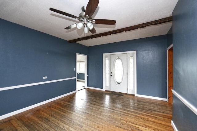 7579 Rangeline Rd, Mount Vernon, OH 43050 - foyer entrance with ceiling fan, beamed ceiling, and wood finished floors