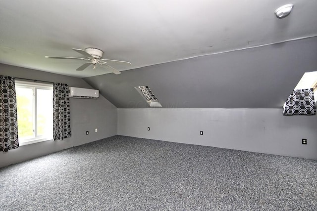 7579 Rangeline Rd, Mount Vernon, OH 43050 - bonus room featuring an AC wall unit, a ceiling fan, vaulted ceiling, and carpet