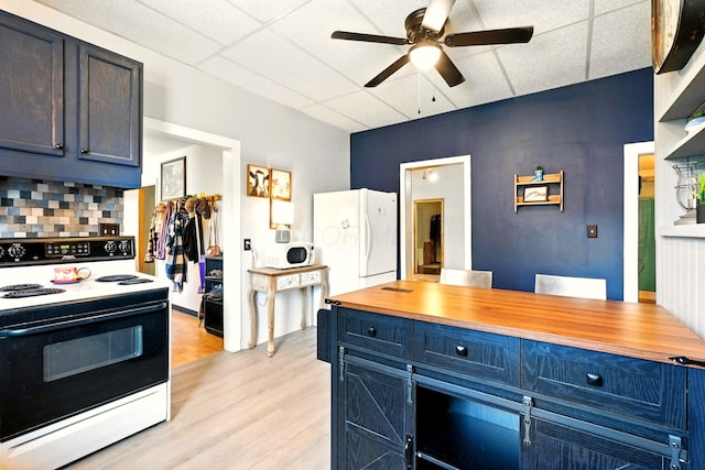 78 E St, Bellville, OH 44813 - kitchen with white appliances, a drop ceiling, light wood-style floors, a ceiling fan, and wooden counters