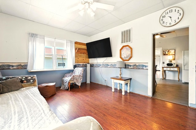 78 E St, Bellville, OH 44813 - bedroom with a drop ceiling, wood finished floors, and freestanding refrigerator