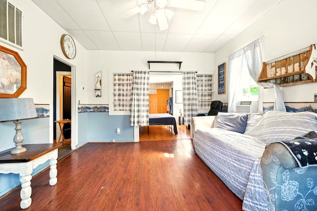 78 E St, Bellville, OH 44813 - living area featuring a ceiling fan, wood finished floors, and cooling unit