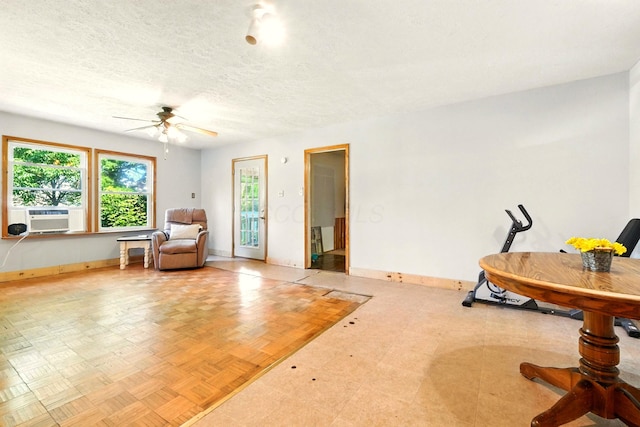 78 E St, Bellville, OH 44813 - sitting room featuring cooling unit, ceiling fan, and a textured ceiling