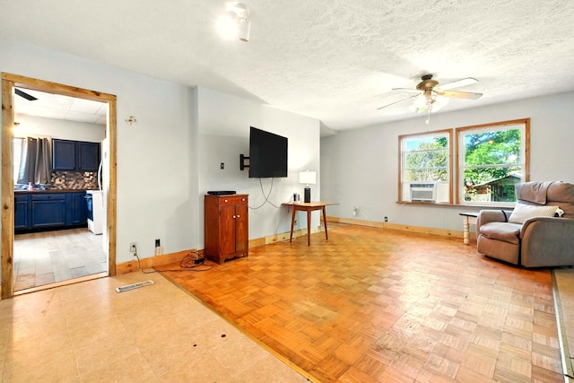 78 E St, Bellville, OH 44813 - living area with ceiling fan and cooling unit