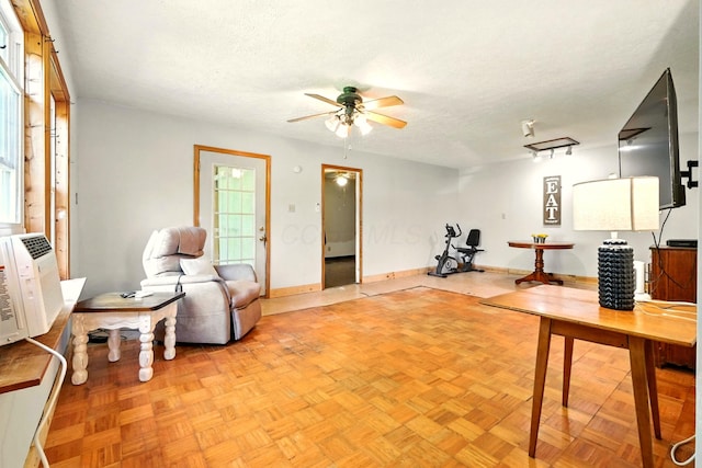 78 E St, Bellville, OH 44813 - living area with a ceiling fan and a textured ceiling