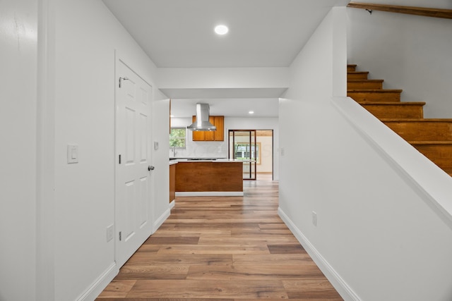 4250 Rutherford Rd, Powell, OH 43065 - hall with light wood finished floors, recessed lighting, and stairway