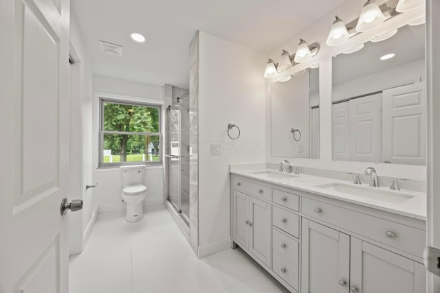 4250 Rutherford Rd, Powell, OH 43065 - full bath featuring double vanity, a stall shower, tile patterned floors, and recessed lighting