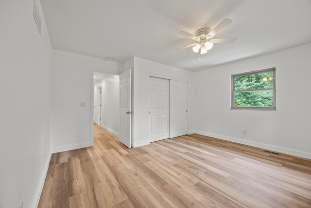 4250 Rutherford Rd, Powell, OH 43065 - unfurnished bedroom with light wood-style flooring, a closet, and ceiling fan