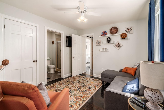 3445 Woodlawn Ave, Grove City, OH 43123 - living room featuring a ceiling fan and dark wood-type flooring