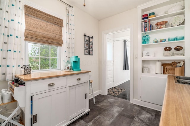 3445 Woodlawn Ave, Grove City, OH 43123 - kitchen featuring wooden counters, open shelves, and white cabinetry
