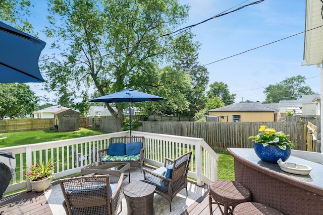 3445 Woodlawn Ave, Grove City, OH 43123 - wooden terrace featuring an outdoor hangout area, a storage unit, and a fenced backyard
