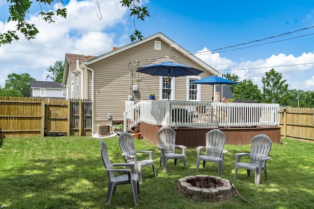 3445 Woodlawn Ave, Grove City, OH 43123 - rear view of house with a fire pit, a fenced backyard, and a deck