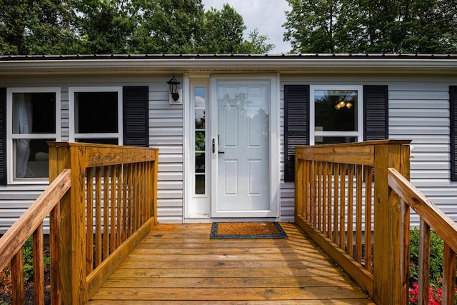 13399 Staddens Bridge Rd SE, Heath, OH 43056 - property entrance with a metal roof and a wooden deck