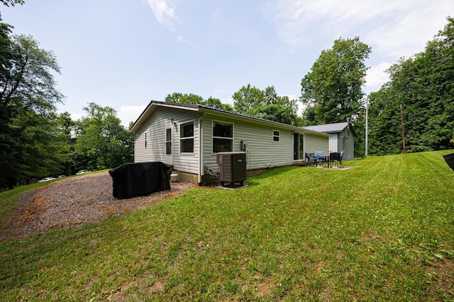 13399 Staddens Bridge Rd SE, Heath, OH 43056 - rear view of house with a lawn and a patio area