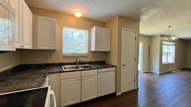 7831 Fairfax Loop Dr, Blacklick, OH 43004 - kitchen featuring white appliances, dark wood-type flooring, dark countertops, white cabinetry, and a textured ceiling