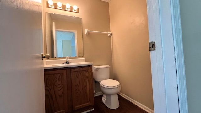 7831 Fairfax Loop Dr, Blacklick, OH 43004 - half bathroom featuring vanity and wood finished floors