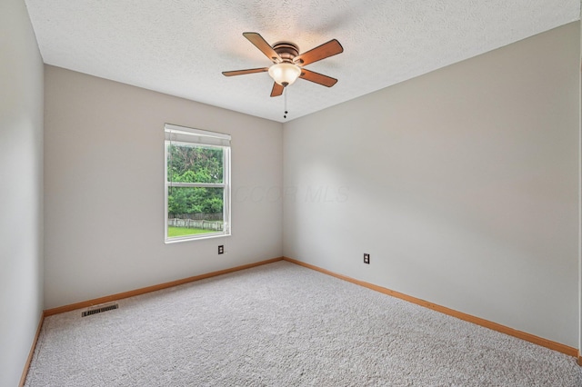 1016 Pebble Brook Dr, Columbus, OH 43240 - carpeted empty room featuring ceiling fan and a textured ceiling