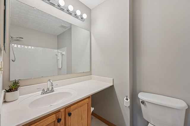 1016 Pebble Brook Dr, Columbus, OH 43240 - full bath with vanity, a textured ceiling, a shower, and tile patterned floors