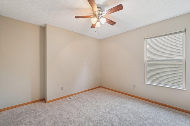 1016 Pebble Brook Dr, Columbus, OH 43240 - empty room with a ceiling fan, light colored carpet, and a textured ceiling