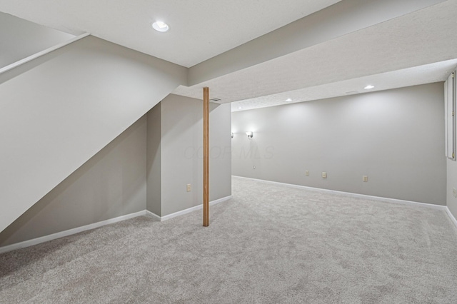1016 Pebble Brook Dr, Columbus, OH 43240 - finished below grade area featuring carpet flooring and recessed lighting