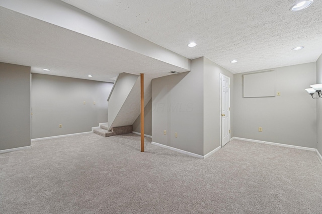 1016 Pebble Brook Dr, Columbus, OH 43240 - finished below grade area with carpet flooring, recessed lighting, a textured ceiling, and stairway