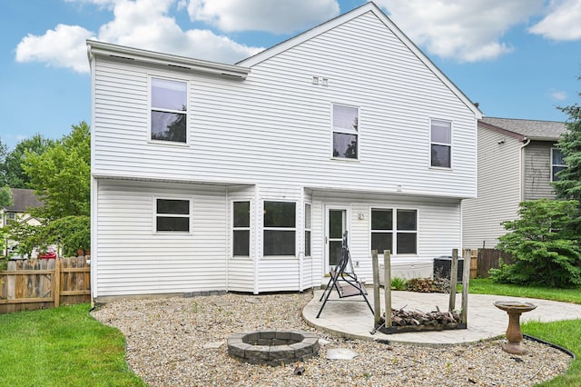 1016 Pebble Brook Dr, Columbus, OH 43240 - rear view of house with an outdoor fire pit and a patio area