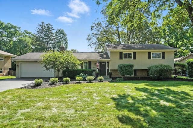 2820 Halstead Rd, Columbus, OH 43221 - tri-level home featuring driveway, a garage, stucco siding, a front lawn, and a chimney