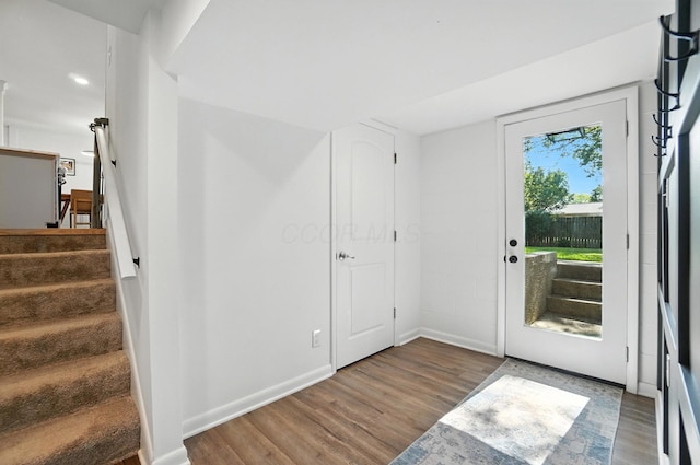 2820 Halstead Rd, Columbus, OH 43221 - foyer entrance featuring wood finished floors, stairway, and recessed lighting