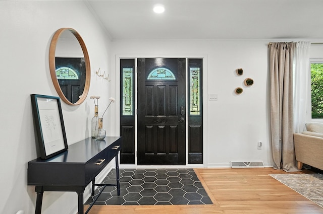 2820 Halstead Rd, Columbus, OH 43221 - foyer entrance with wood finished floors and recessed lighting