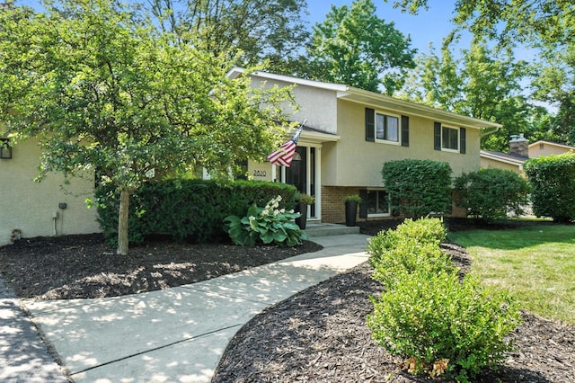 2820 Halstead Rd, Columbus, OH 43221 - split level home featuring stucco siding and brick siding