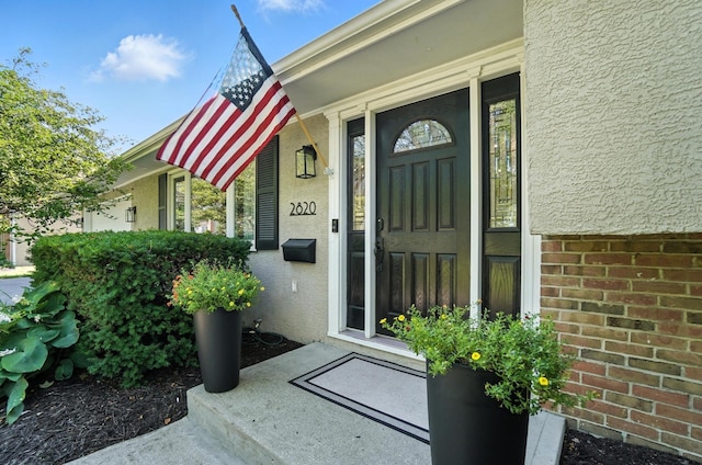 2820 Halstead Rd, Columbus, OH 43221 - entrance to property featuring stucco siding and covered porch