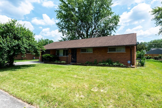 3505 Roswell Dr, Columbus, OH 43227 - ranch-style house with brick siding and a front yard