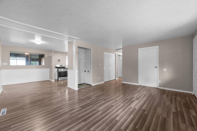 3505 Roswell Dr, Columbus, OH 43227 - unfurnished living room featuring dark wood-type flooring