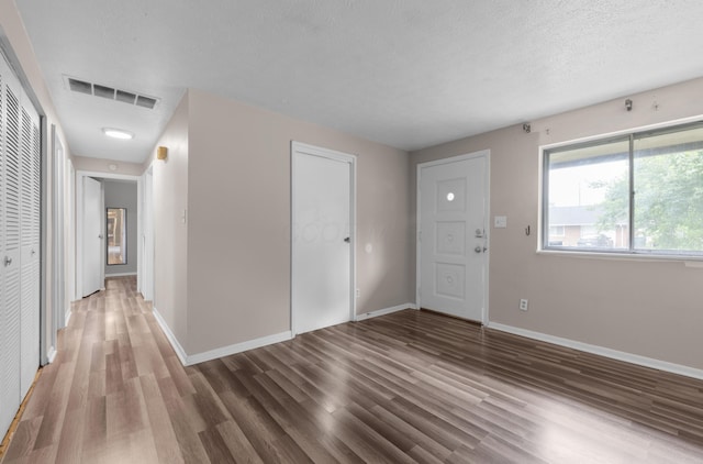 3505 Roswell Dr, Columbus, OH 43227 - entryway with wood finished floors and a textured ceiling