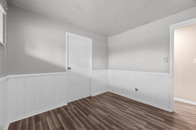 3505 Roswell Dr, Columbus, OH 43227 - empty room with a wainscoted wall and wood finished floors