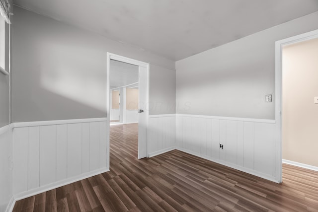3505 Roswell Dr, Columbus, OH 43227 - unfurnished room with wainscoting and wood finished floors