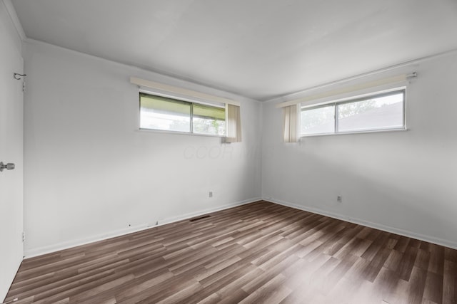 3505 Roswell Dr, Columbus, OH 43227 - spare room with wood finished floors and baseboards