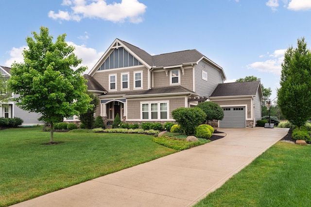 6196 Streamside Dr, Galena, OH 43021 - craftsman-style house with stone siding, a garage, concrete driveway, and a front lawn