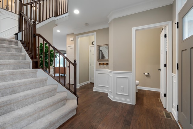 6196 Streamside Dr, Galena, OH 43021 - stairs featuring ornamental molding, wood finished floors, and recessed lighting